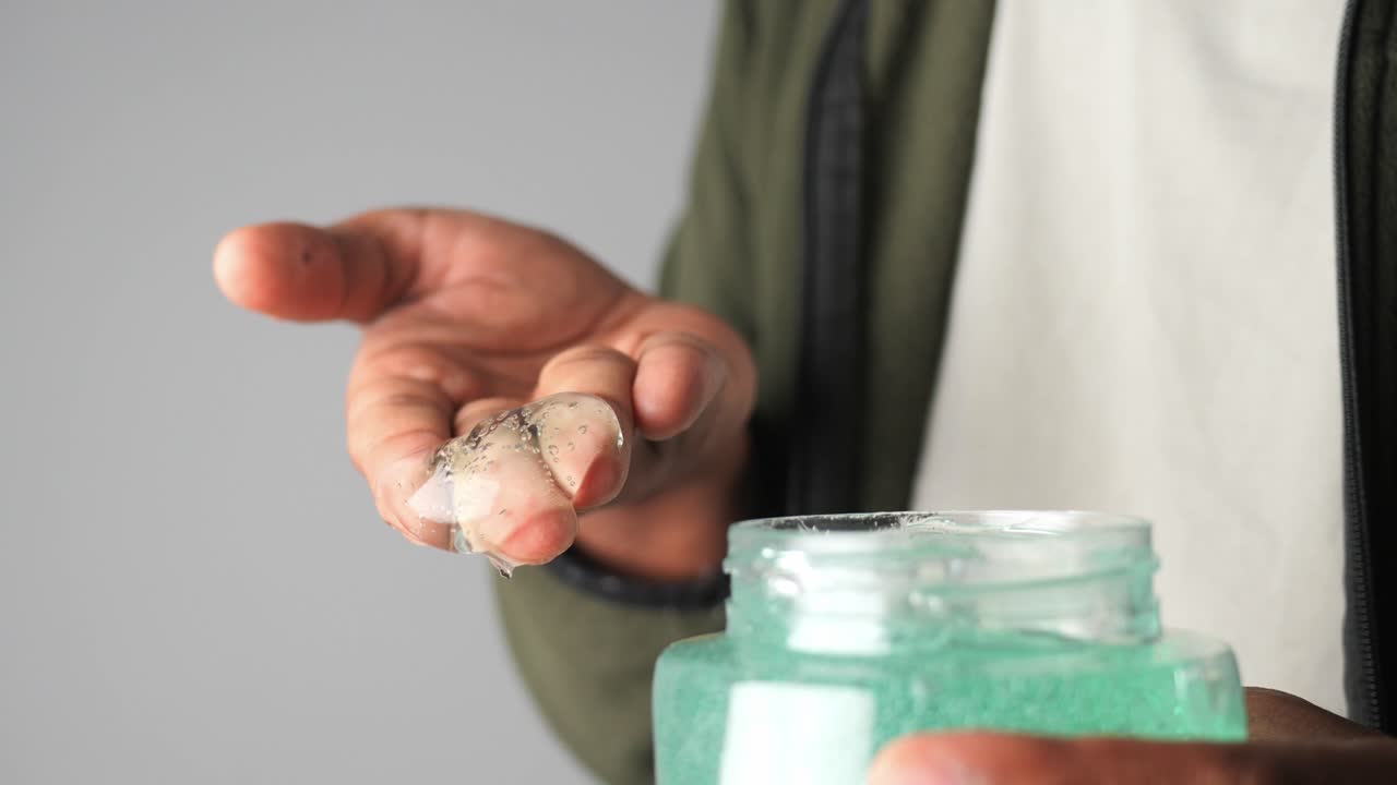 Man holding hair gel