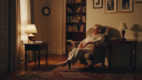 elderly woman relaxing in her living room