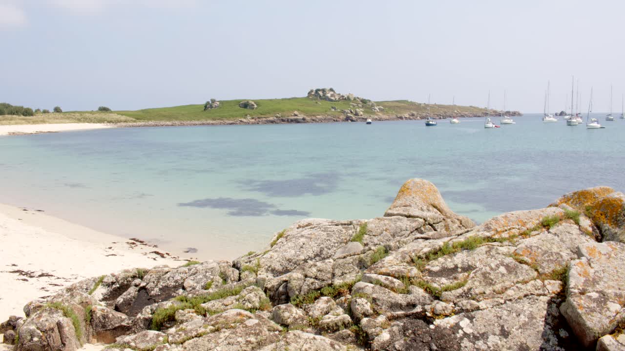 wide shot of the natural harbour, on St Agnes and Gugh at the Isles of Scilly