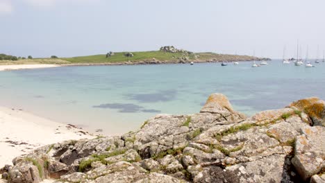 wide shot of the natural harbour, on st agnes and gugh at the isles of scilly