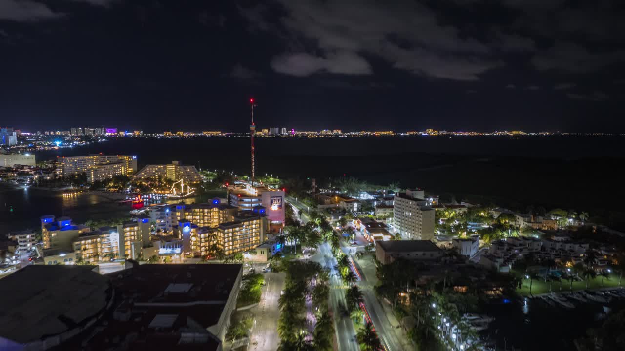 Drone forward Hyperlapse of Canc&uacute;n city at night, M&eacute;xico