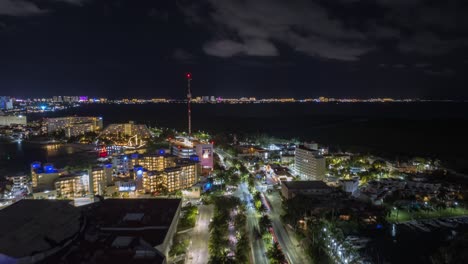 Drone-forward-Hyperlapse-of-Cancún-city-at-night,-México