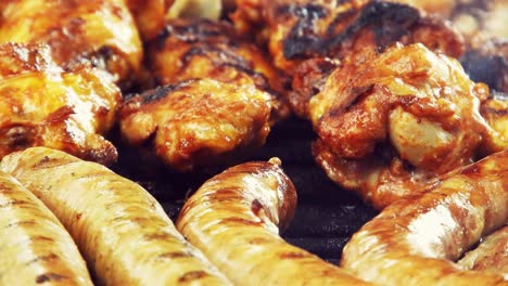 assorted delicious grilled meat, top view, sausages, chicken, pork