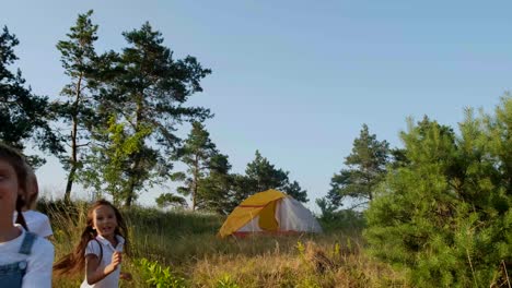 children camping in nature