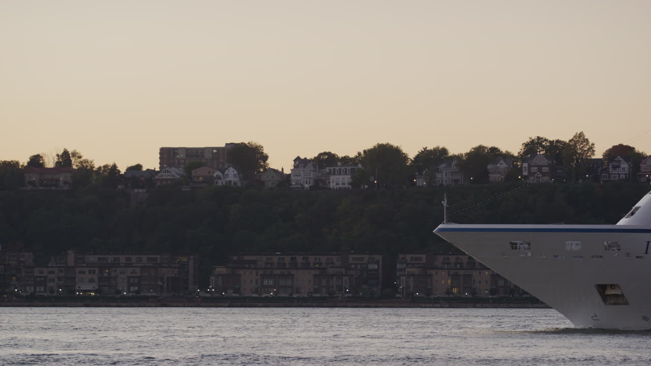 Cruise Ship Insignia Sailing at Sunset