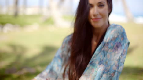 Attractive-Woman-at-the-Beach-Looking-at-Camera