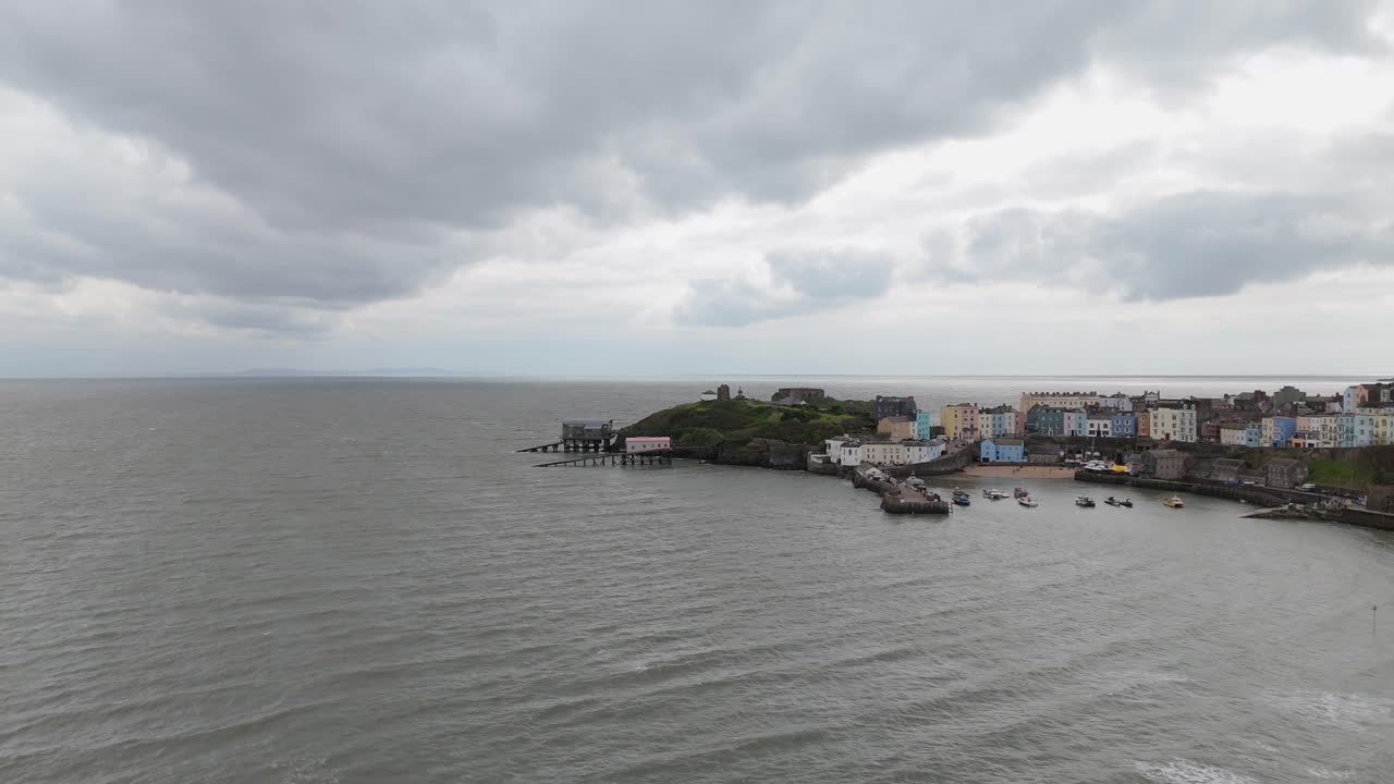 Typical Welsh sandy beaches and colourful houses in Tenby, United Kingdom