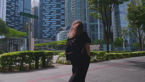 woman walking in a city
