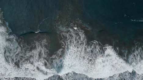 ocean waves breaking on the beach. aerial view