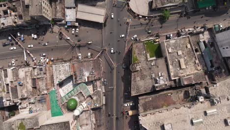 top down aerial view of urban streets in lahore, pakistan - cars driving in city