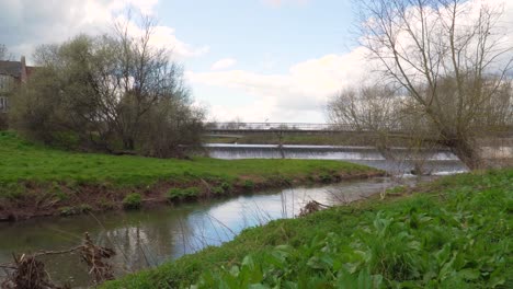 4k river tone in taunton somerset, blue sky background