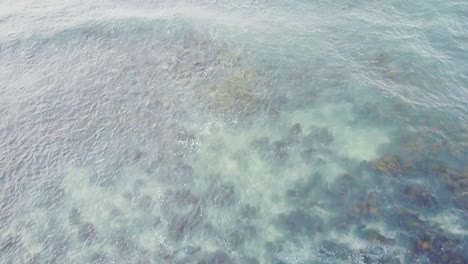 Aerial-shot-pointed-down-at-Icelandic-Se-Coast-off-of-Sandgerdi,-Iceland