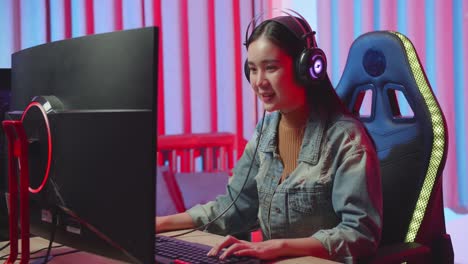 woman gaming on computer