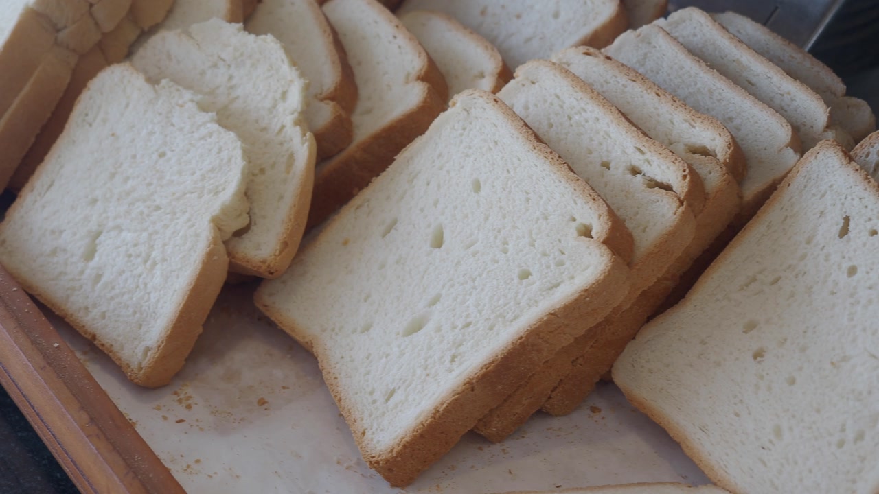 Close-up of Fresh White Bread Slices on a Tray