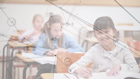 animation of network of connections over schoolgirls writing