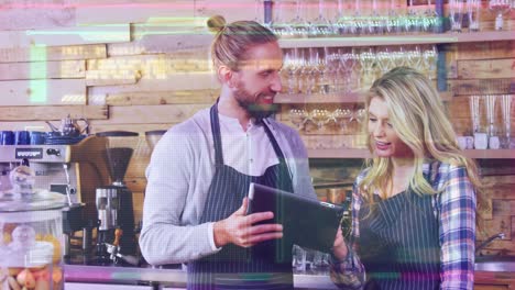 Animation-of-computer-language-over-caucasian-coworkers-discussing-over-digital-tablet-in-restaurant