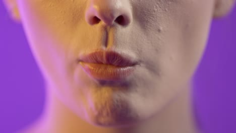 attractive woman eating popcorn, close up mouth