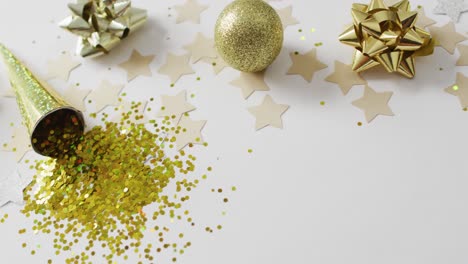 decorations and stars on white background at new year's eve