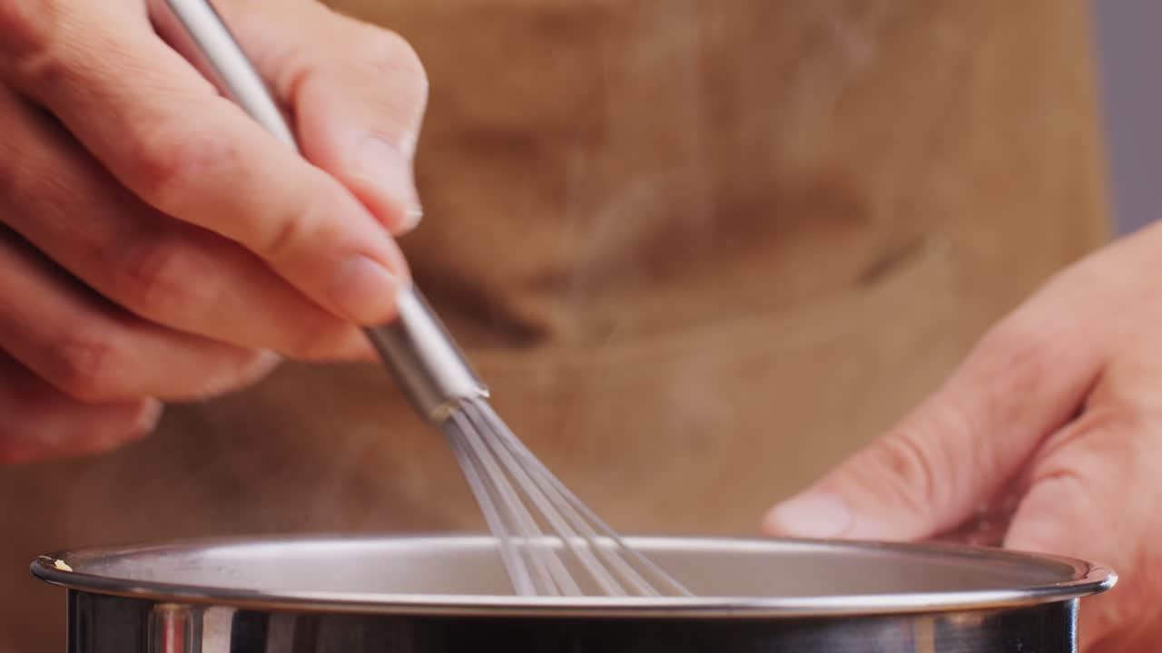 Chef Cooking Spanish traditional food, catalonian dessert, crema catalana, catalan cream, spanish dessert close up, cooking.