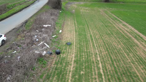 litter in essex uk countryside low panning drone aerial