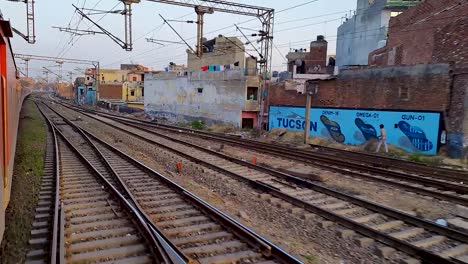 passenger train running on track crossing city at morning video is taken at new delhi railway station on aug 04 2022