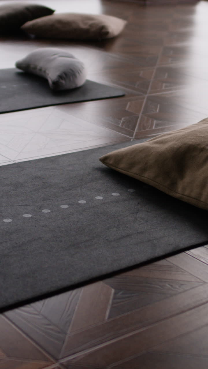 Yoga mats and cushions in a studio