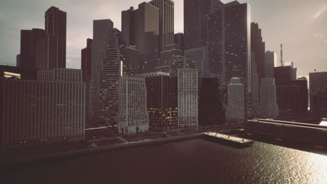 city skyline during twilight with reflections on water near buildings