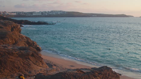 low cliffs and ocean at little fistral, newquay in cornwall - static shot