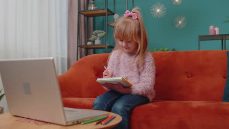 Online-education-at-laptop-of-little-child-girl-at-home-virtual-class,-modern-distance-e-learning