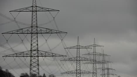 connecting the nation: a timelapse of electrical transmission lines in a cloudy sky