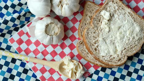 top view of garlic spread on a spoon ,