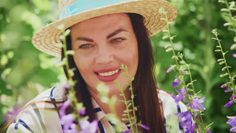 woman gardening among purple flowers