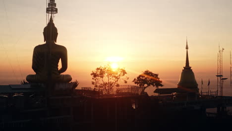 sunrise at a mountaintop temple in thailand