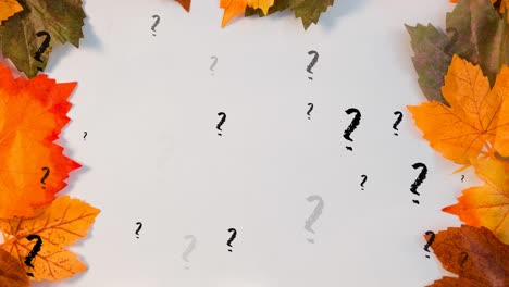 Animation-of-question-marks-over-leaves-on-white-background