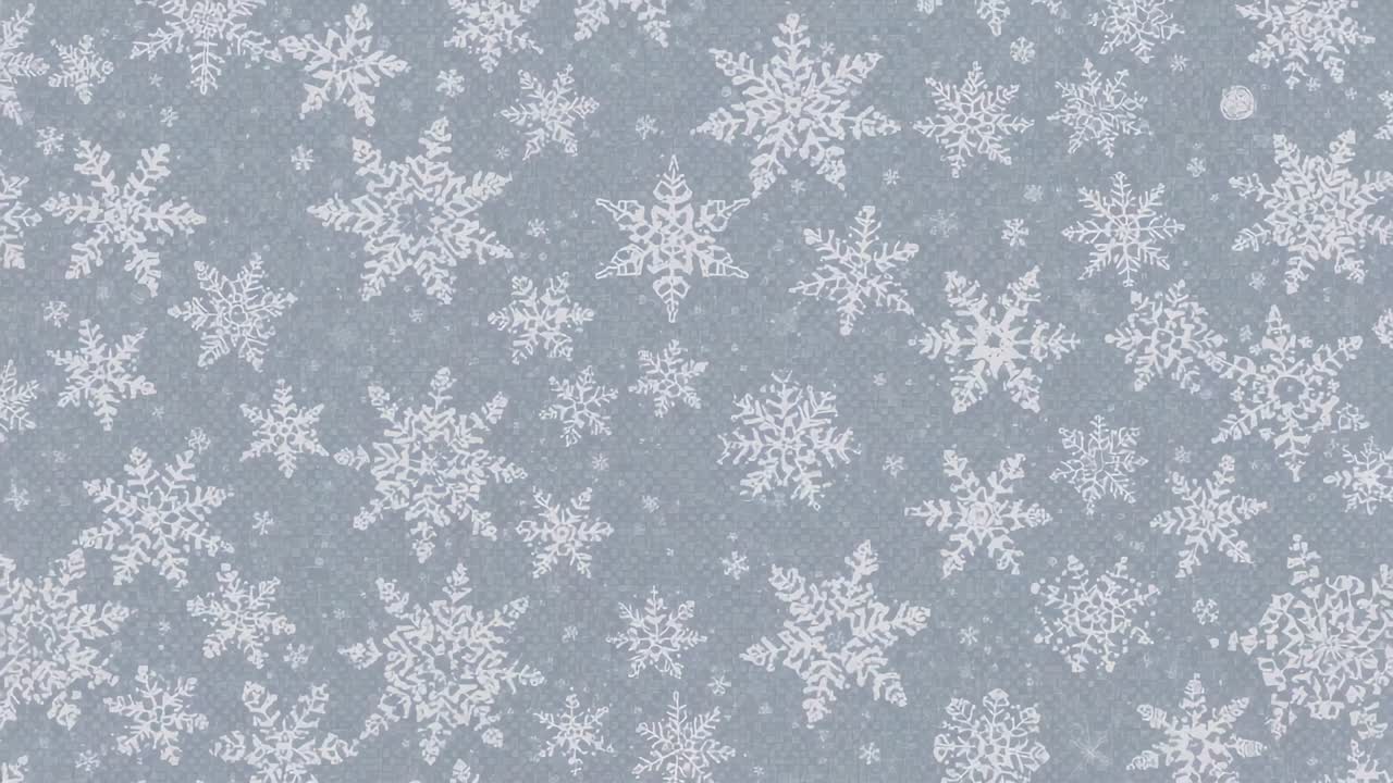 Shifting close-up camera moving right and down over gray-blue textile, revealing white snowflakes