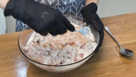 preparing chicken mixture for cooking