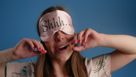 woman with sleep mask, happy and tired