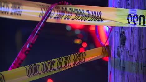 POLICE-TAPE-AROUND-CRIME-SCENE-AT-NIGHT