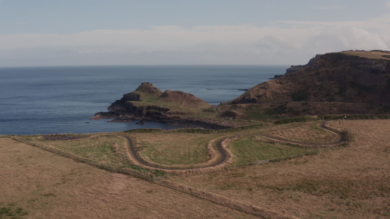 Coastal Landscape and Winding Road at the Giants Causeway