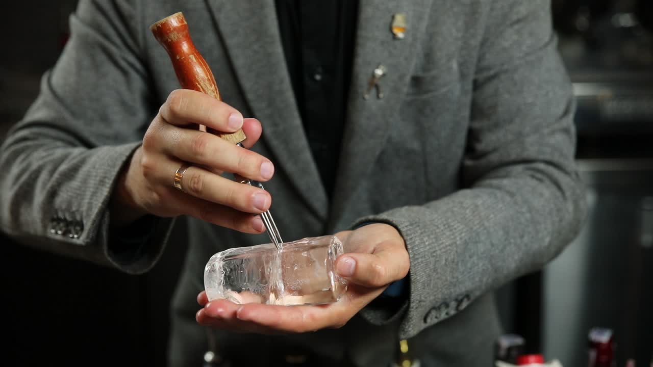 Bartender preparing cocktails with ice