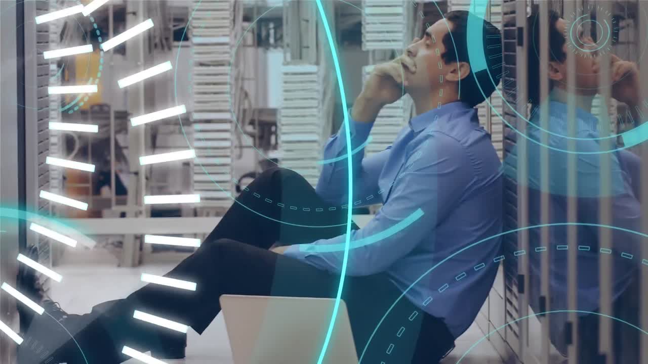 Man sitting on the floor and 5G written in the middle of a futuristic circles