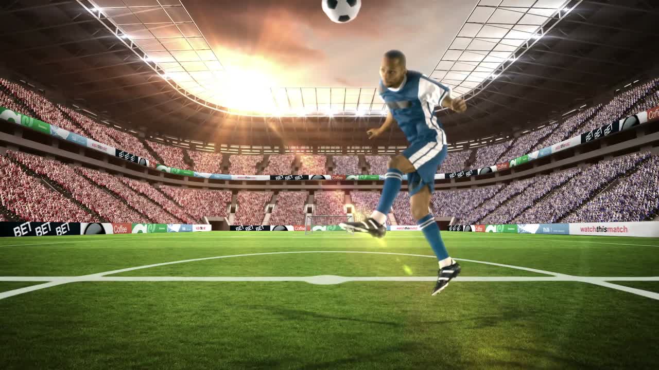 Football player kicking the ball with head