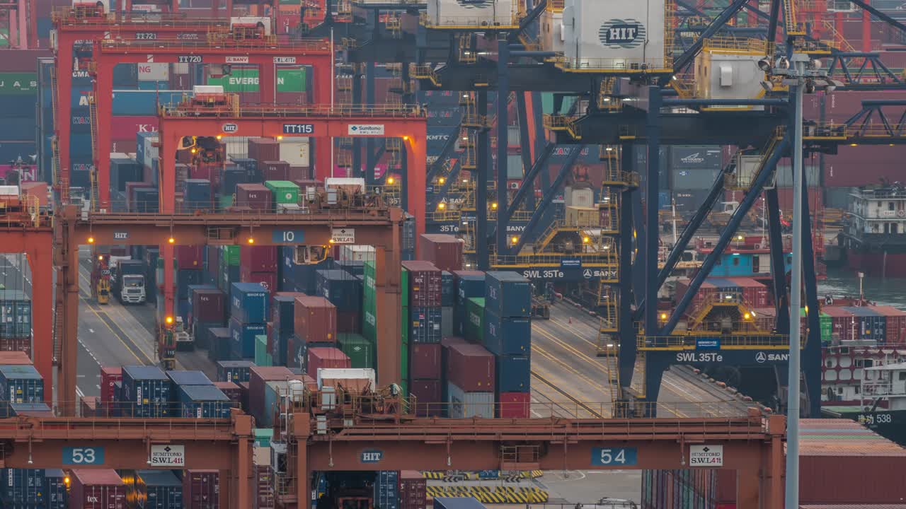 HONG KONG, HONG KONG - JANUARY 9, 2019 Timelapse of industrial shipping port with containers and cranes. Aerial view logistic of import and export cargo port in harbor, Hong Kong on January 9, 2019.