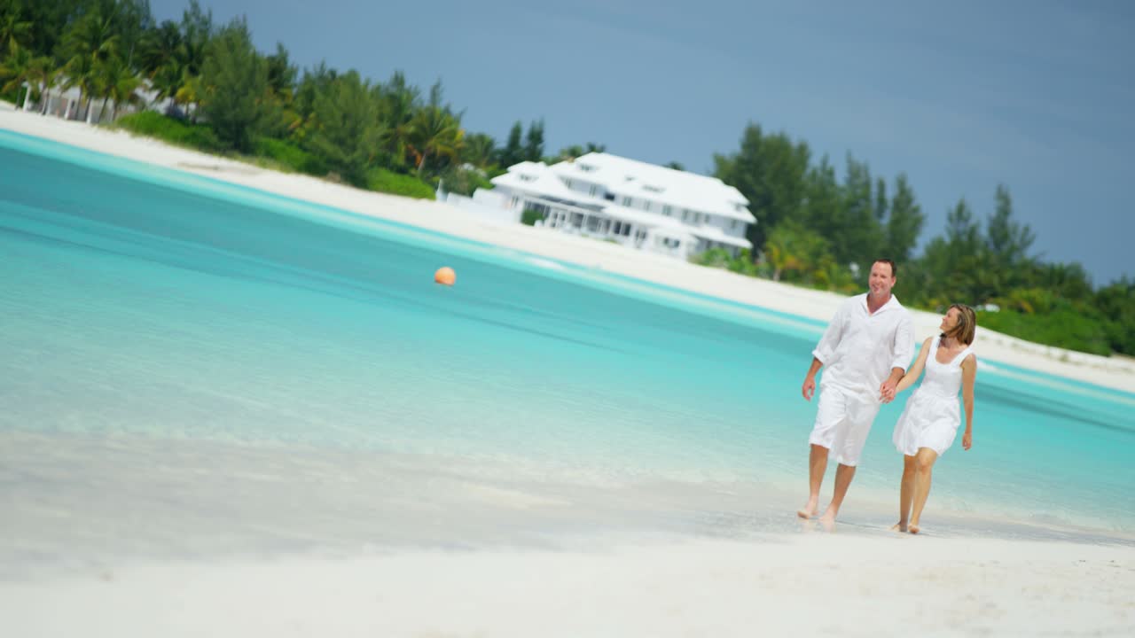 Happy young Caucasian couple together on island vacation