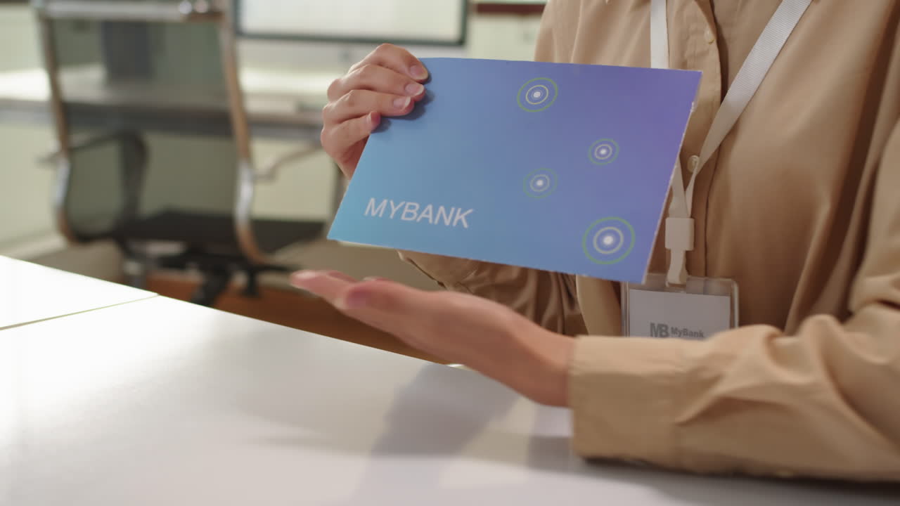 Client Taking Envelope with Credit Card at Bank Office