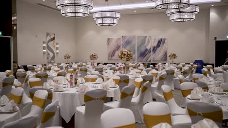 a shot captures the dining area at a timeless wedding, adorned with an exquisite theme