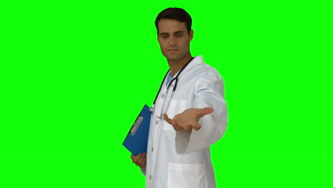 Joven-Doctor-Presentando-Con-La-Mano