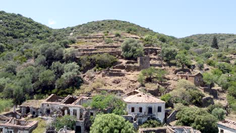 revealing aerial of abandonated rural village of karavas in kythira island, greece