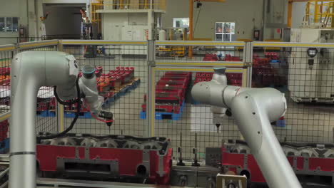 Industrial workshop technology concept, robotic automation automotive vehicle production factory without human working in production line manufacturing engines heavy duty truck in spacious car plant