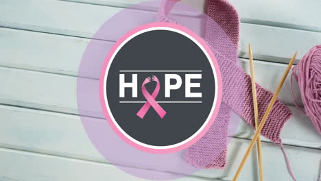 animation of hope writing over pink ribbon on white wooden background